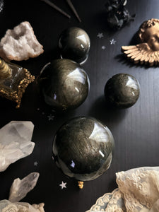 Sphères d’obsidienne dorées